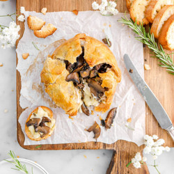Puff Pastry Wrapped Baked Brie With Mushrooms Rosemary And Garlic