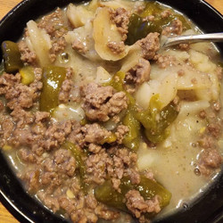 Fried Potatoes With Green Chile Poured Over It