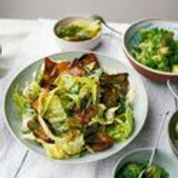 Harissa-baked potato skins and crispy lettuce salad (Ottolenghi)