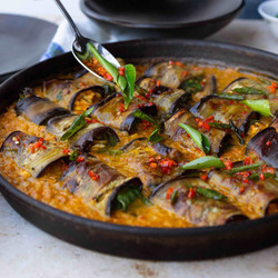 Yotam Ottolenghi’s Stuffed Eggplant In Curry And Coconut Dal