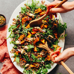 Roasted Squash Arugula Salad With Crispy Shallot And Balsamic Reduction
