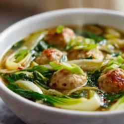 Ginger Chicken Meatball Soup With Baby Bok Choy And Wonton Strips