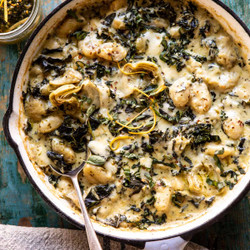 Skillet Baked Creamy Pesto Spinach And Artichoke Gnocchi.