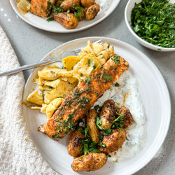 Sheet Pan Salmon With Roasted Potatoes, Artichokes, &amp; Yogurt Sauce