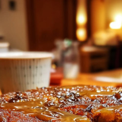 Sticky Apple And Date Pudding With Zesty Citrus Syrup