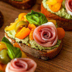 Tomato Crostini With Pesto And Ricotta