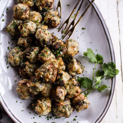 Spicy Fontina Spinach, Artichoke And Chorizo Stuffed Mushrooms.