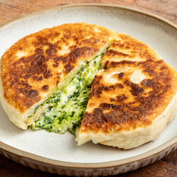 Cavolo Nero Pesto And Taleggio-stuffed Sourdough Flatbreads