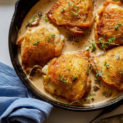 Crispy Chicken Thighs In A Creamy Mushroom Sauce