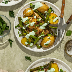 Sheet Pan Chicken Thighs With Asparagus And Herby Yogurt Sauce