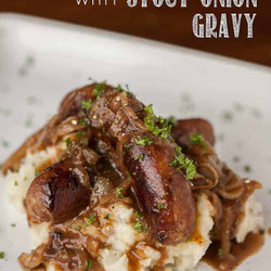 Bangers And Mash With Stout Onion Gravy