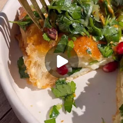 Feta in puff pastry with parsley and pomegranate salad