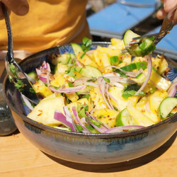 Spicy Pineapple and Cucumber Salad with Fish Sauce, Chilies, Herbs, and Lime