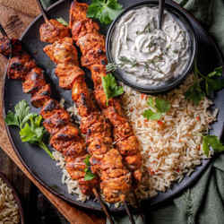 Citrus Achiote Chicken Skewers With Three Pepper Rice
