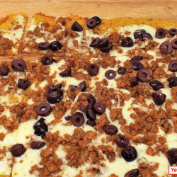 Polenta Pizza Squares With Ground Pork And Kalamata Olives
