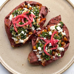 Loaded Sweet Potato With Maple Sriracha Yogurt And Almond Salsa Verde