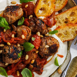 Lamb &amp; Feta Balls With Tomatoes On Greek Yoghurt