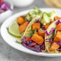 Sweet Potato Tacos With Black Beans And Cabbage Slaw