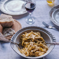 Tagliatelle Pasta With Black Truffle Sauce And Porcini Mushrooms