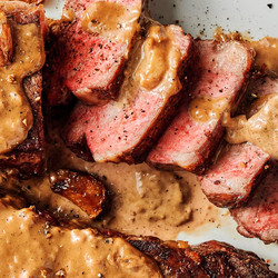 Steak With Bourbon Garlic Cream Sauce