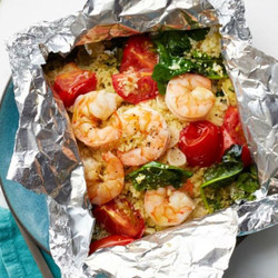 Shrimp And Garlicky Tomatoes With Kale Couscous