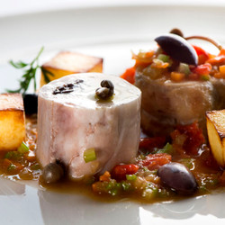 Rabbit, Olives, Capers, Tomatoes And Potatoes