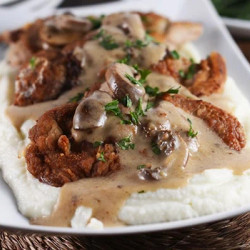 Smothered Crispy Pork Cutlets With Cauliflower Mash