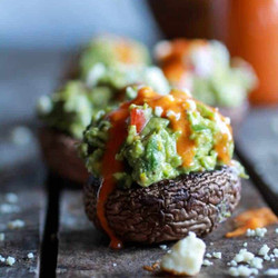 Blue Cheese Guacamole Stuffed Mushrooms With Buffalo Sauce
