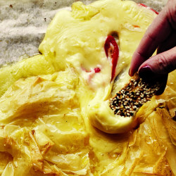 Baked Brie With Phyllo, Hot Honey, And Anchovies
