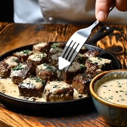 Tender Steak Bites In Garlic Butter With Creamy Parmesan Sauce