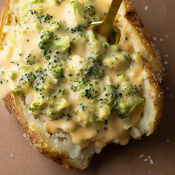 Cheesy Baked Potatoes With Broccoli Cheese Sauce