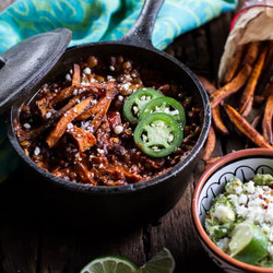 Spicy Black Bean And Lentil Chili With Cotija Guacamole + Chipotle Sweet Potato Fries.