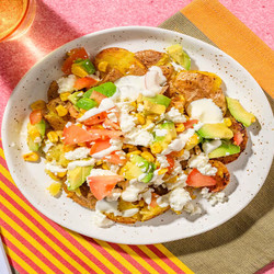 Loaded Honey Peri Peri Smashed Potatoes  With Charred Corn Salsa, Greek Style Cheese And Avocado