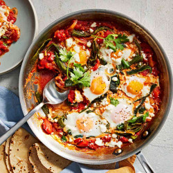 Huevos Rabo De Mestiza (poached Eggs In Tomato-poblano Rajas Sauce)