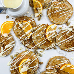 Carrot Cake Pancakes With Orange Cream Cheese Glaze