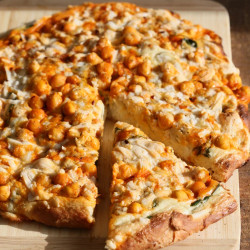 Buffalo Chickpea Pizza With White Garlic Sauce And Celery Ranch Dressing