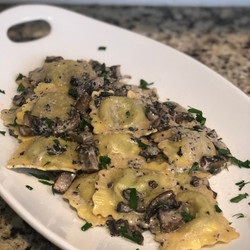 Ravioli With Black Truffle Cream Sauce