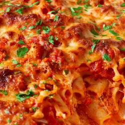 How To Make A Baked Ziti Pasta Dish Layered With Sauce And Cheese