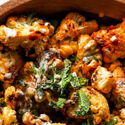 Harissa-roasted Cauliflower And Chickpeas With Lemony Tahini