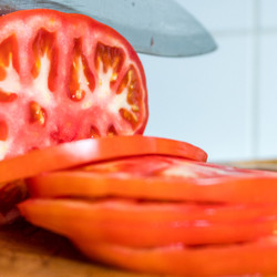 The Secret Ingredient That Gives Bland Tomatoes An Umami Boost