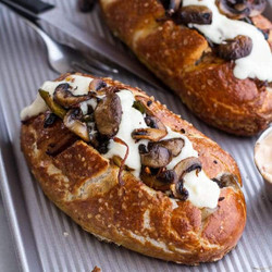Cleveland Cheesesteaks With Pretzel Hoagie Rolls.