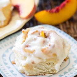 Peach Cinnamon Rolls With A Cream Cheese Glaze