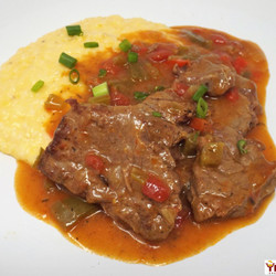 Grillades And Cheddar Cheese Grits