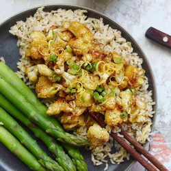 Roasted Cauliflower In A Sticky Lemon Sauce With Steamed Asparagus