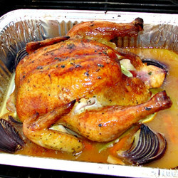 Herb And Lemon Chicken In A Clay Pot