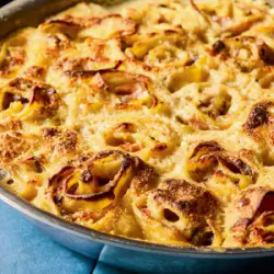 Nidi Di Rondine (fresh Pasta Rolls With Ham, Cheese, Mushrooms, And Besciamella)