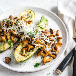 Whipped Cottage Cheese Stuffed Zucchini Boats Topped With Chanterelle Mushrooms