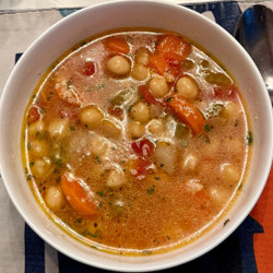 Chickpea vegetable soup with parmesan, rosemary and lemon