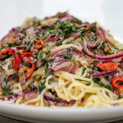 Spaghetti With Anchovies, Chilli, Garlic, Parsley, Orange Zest And Capers
