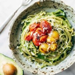 Burst Tomato And Zucchini Spaghetti With Avocado Sauce